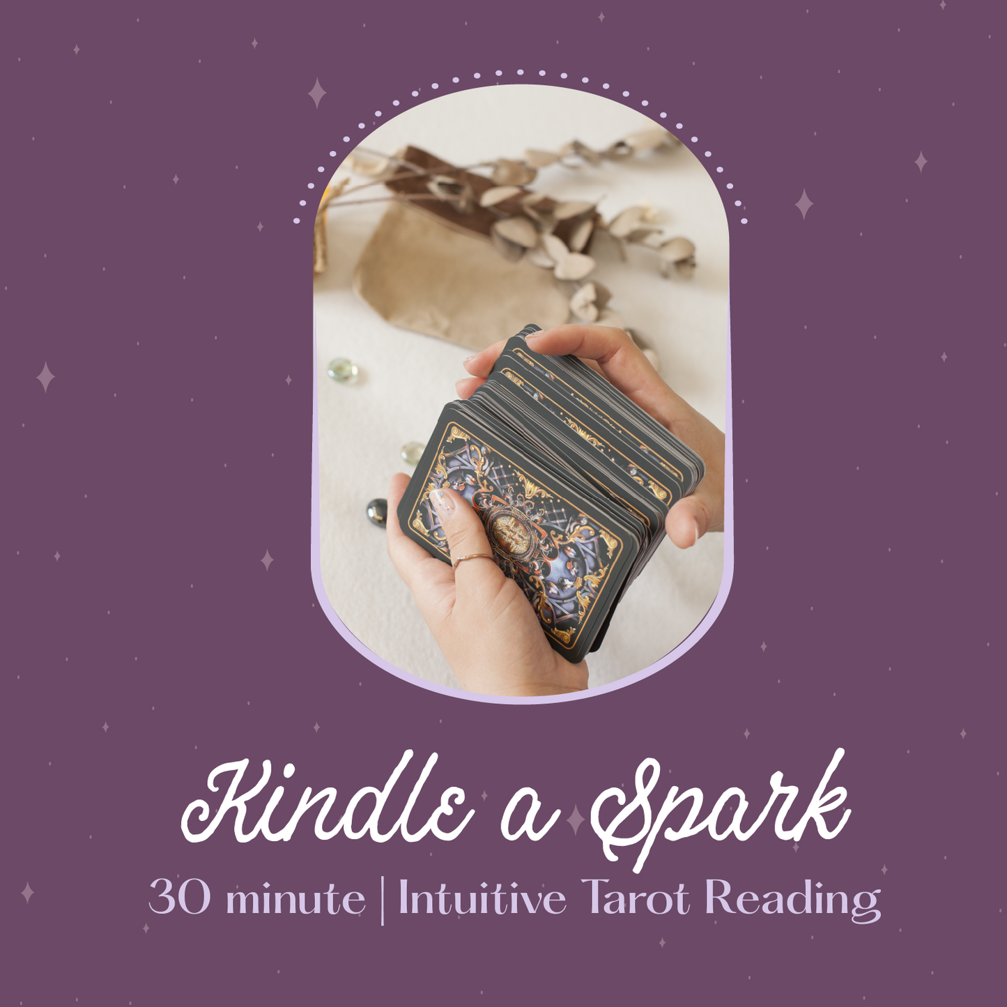 Hand holding tarot cards with 'Kindle a Spark' text on a purple background