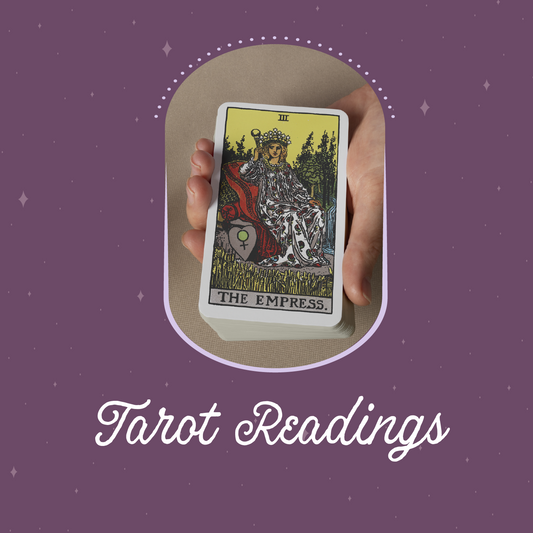 Hand holding a tarot card titled 'The Empress' on a purple background with 'Tarot Readings' text.